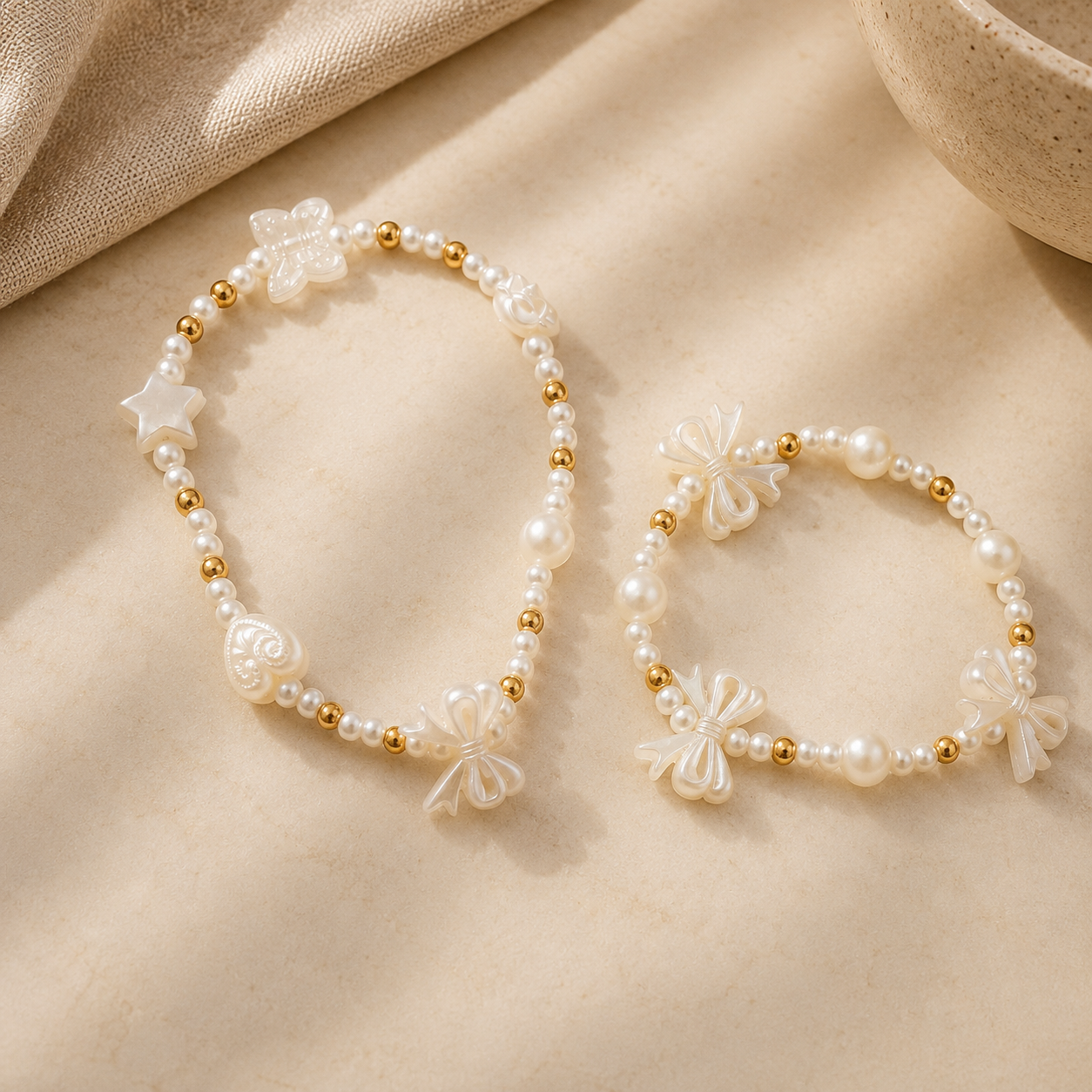 Elegant Pearl Bow Charm Bracelet Collection