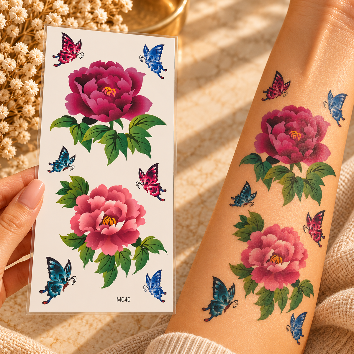 Pink floral and butterfly temporary tattoo sheet and applied design on arm