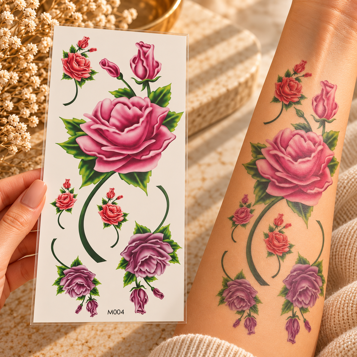 Pink and purple rose and rosebud temporary tattoo sticker sheet shown alongside tattoos on an arm