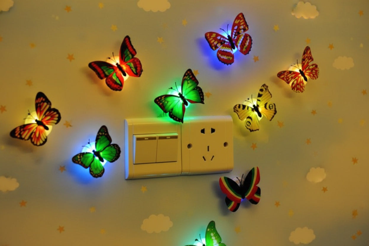 Colorful butterfly-shaped night lights on a floral wall.