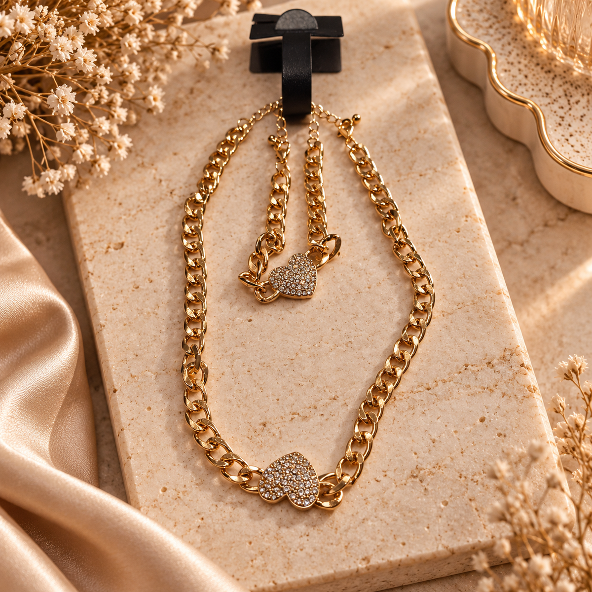 Gold-tone chunky chain necklace and bracelet set with crystal heart accents