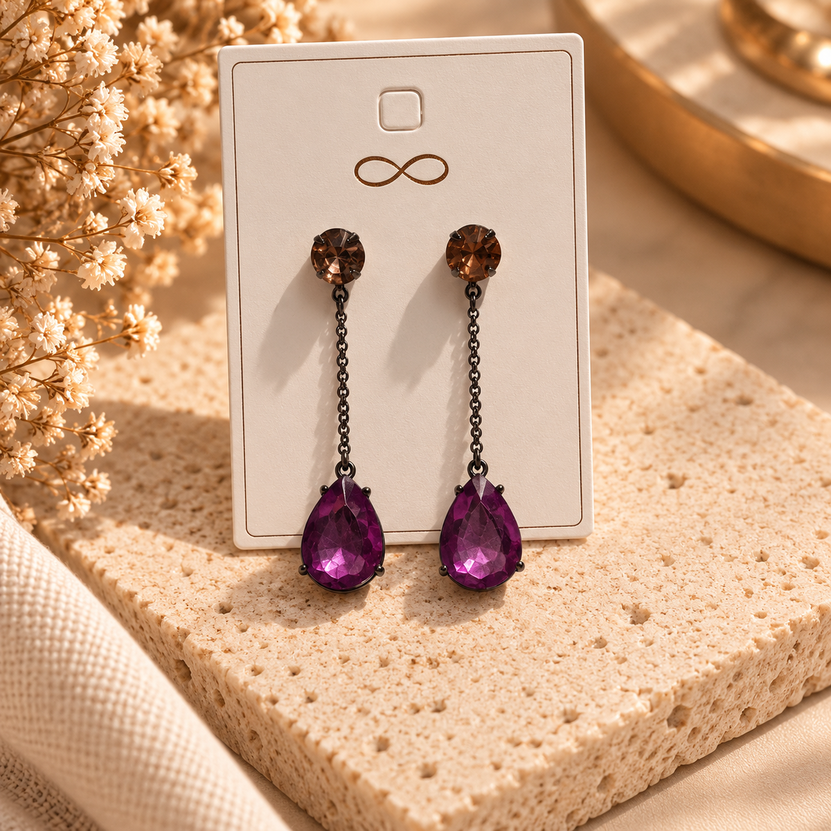 Purple faceted teardrop earrings with smoky-brown crystal studs and long chain drops