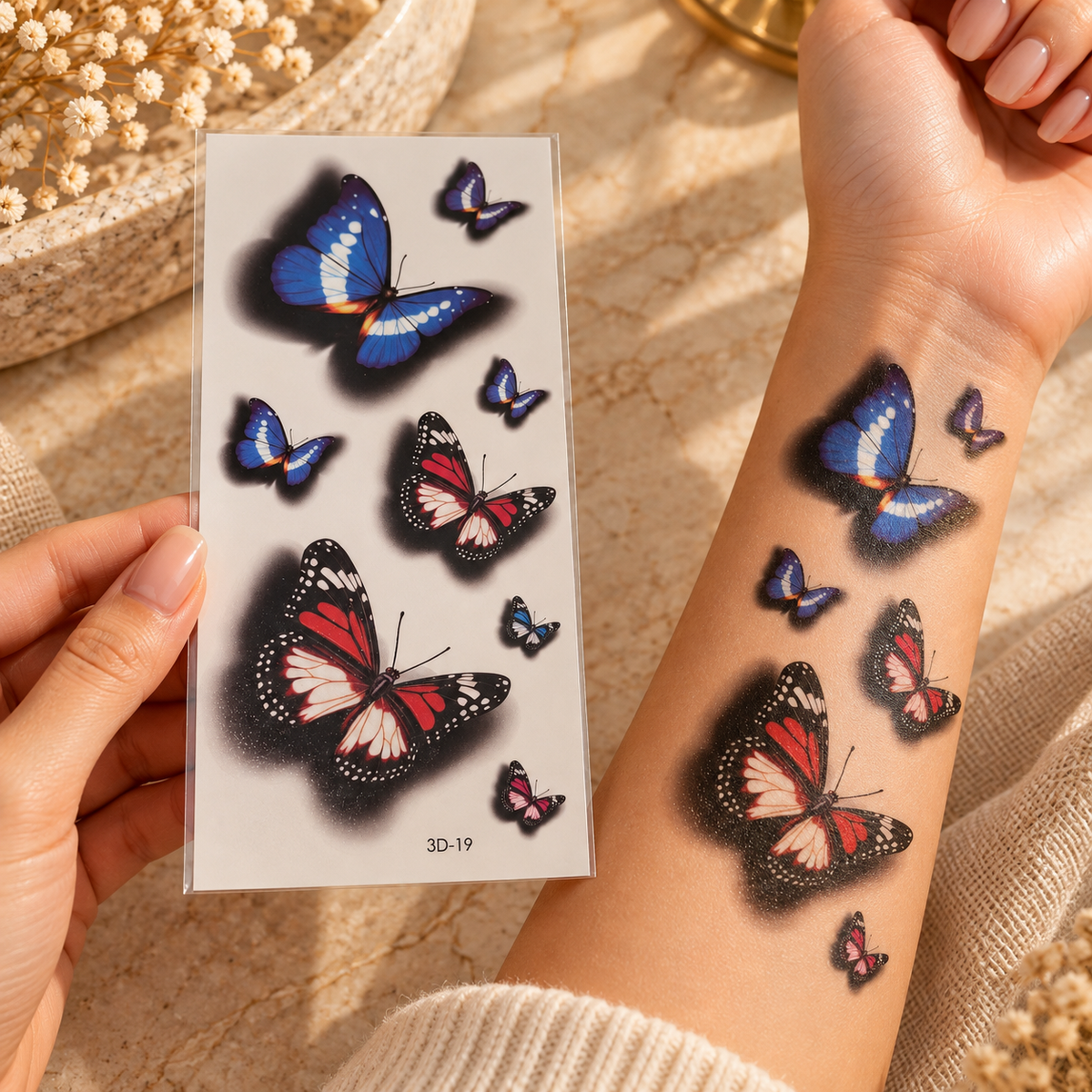 3D blue and red butterfly temporary tattoo sheet shown applied to a forearm