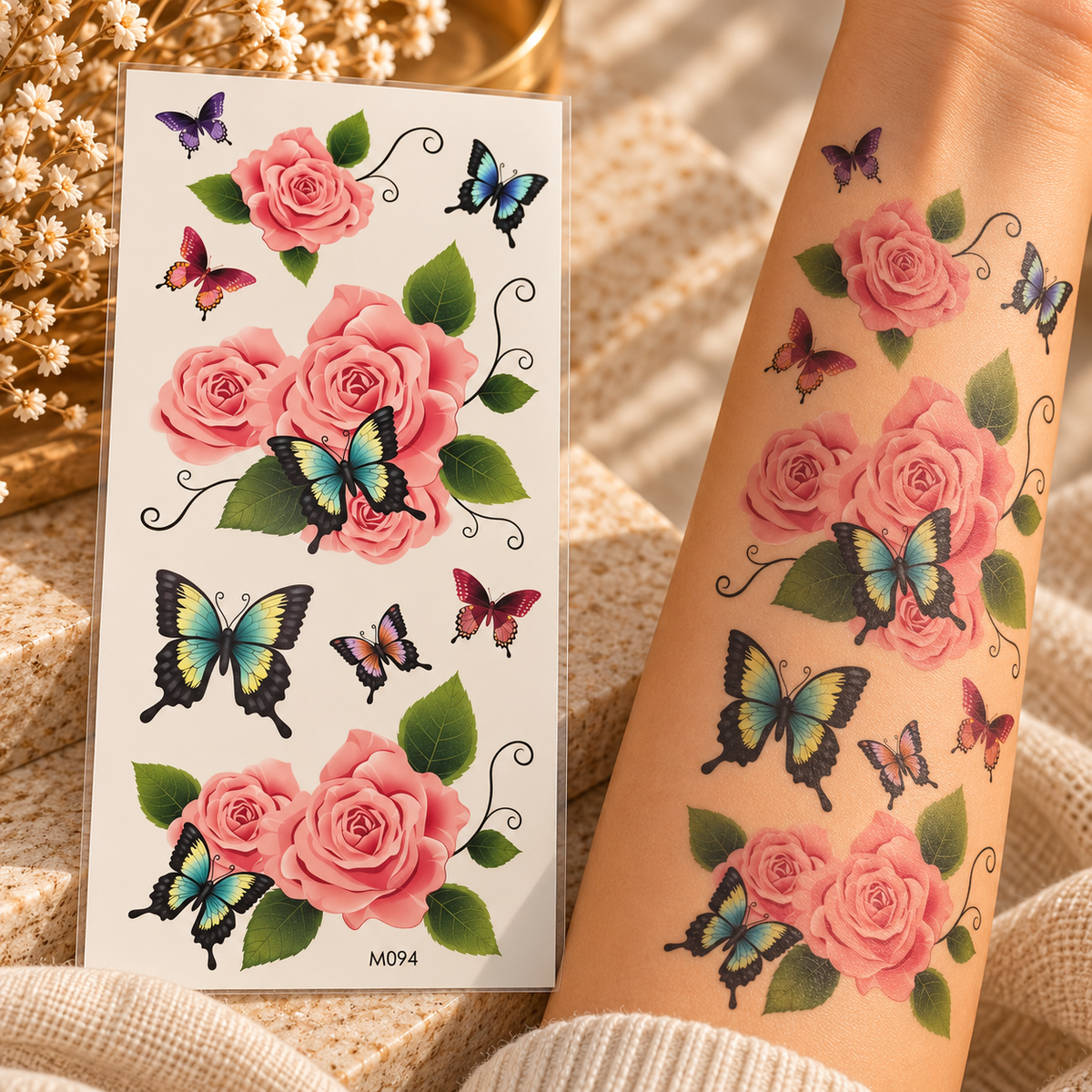 Pink rose and colourful butterfly temporary tattoo stickers shown on a sheet and applied to an arm