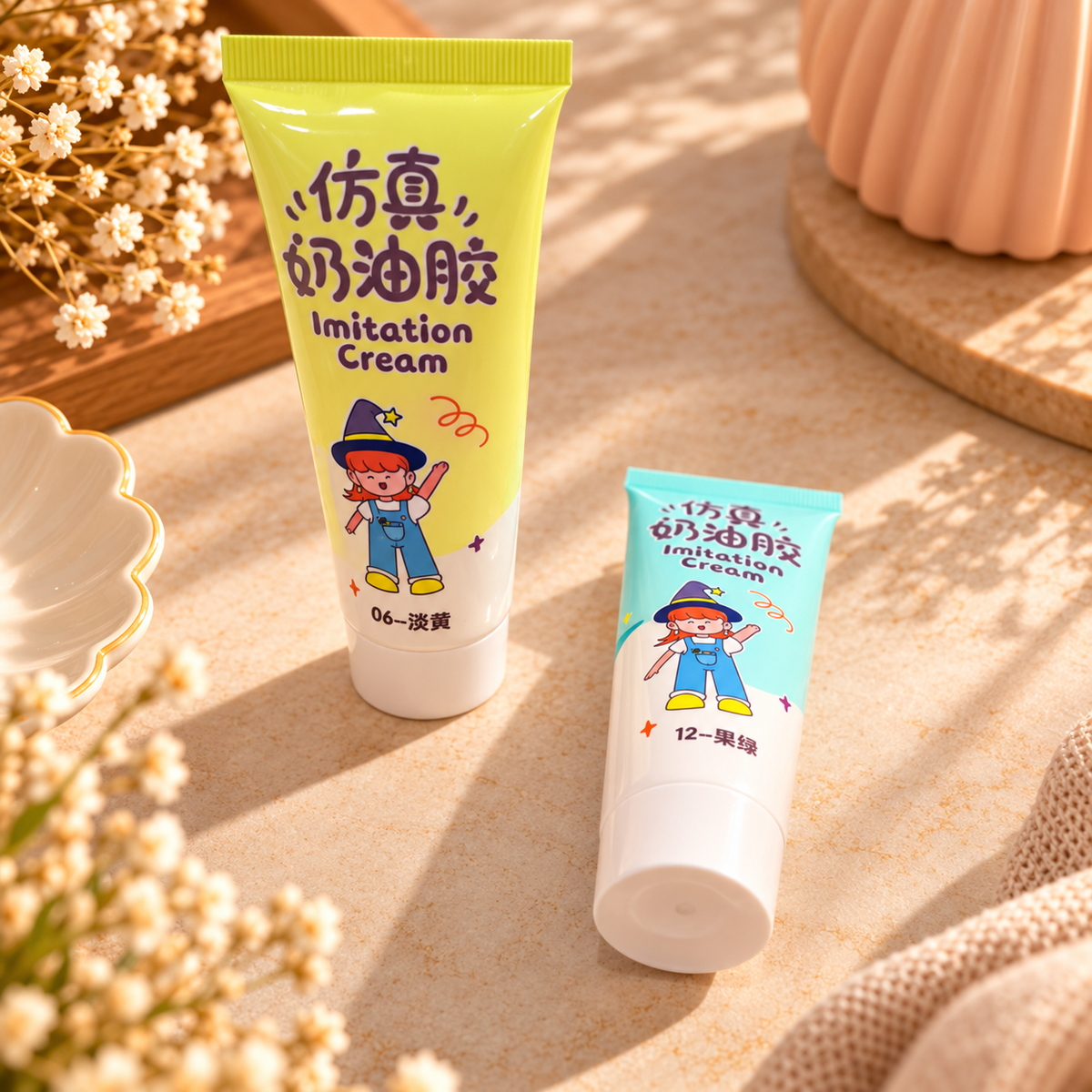 Two assorted-colour imitation cream glue squeeze tubes for craft decoration