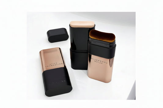 Stick foundation with black and rose gold packaging on a white background