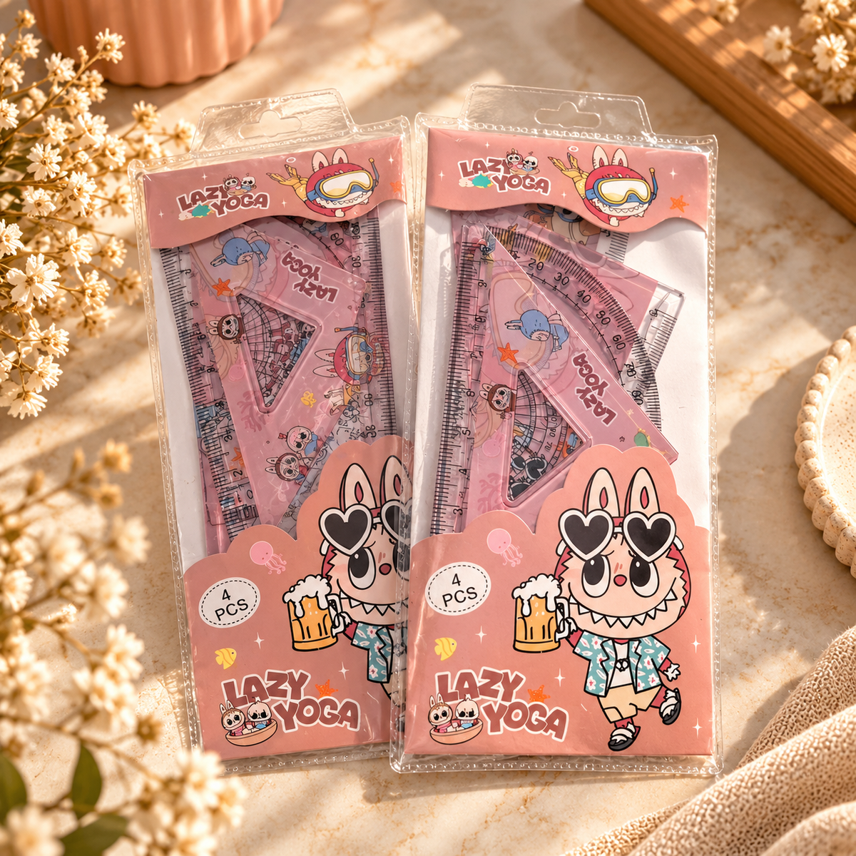 Pink cartoon four-piece geometry sets in protective sleeves