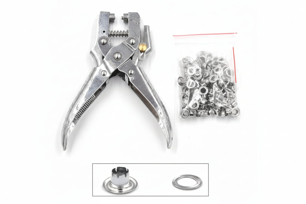 Metal eyelet punching tool with eyelets on a white background