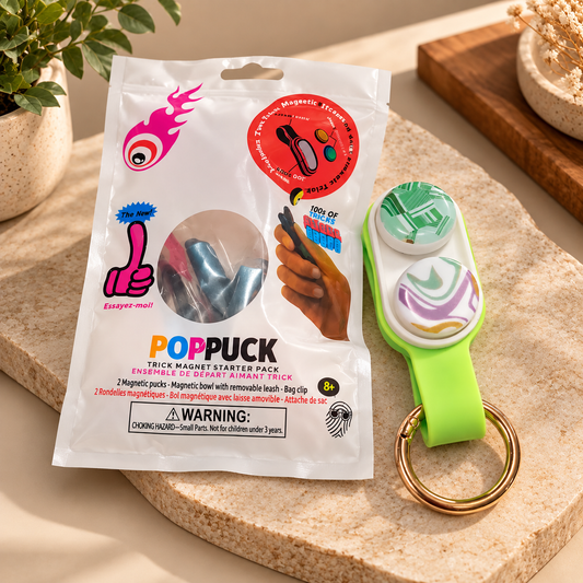 Pop Puck magnetic trick starter pack with two pucks and green strap