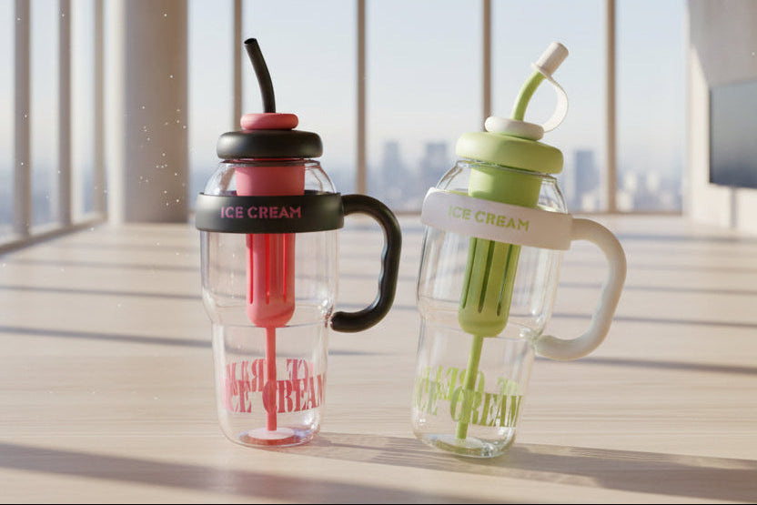 Two transparent water bottles with colorful straws on a wooden surface with a cityscape view.